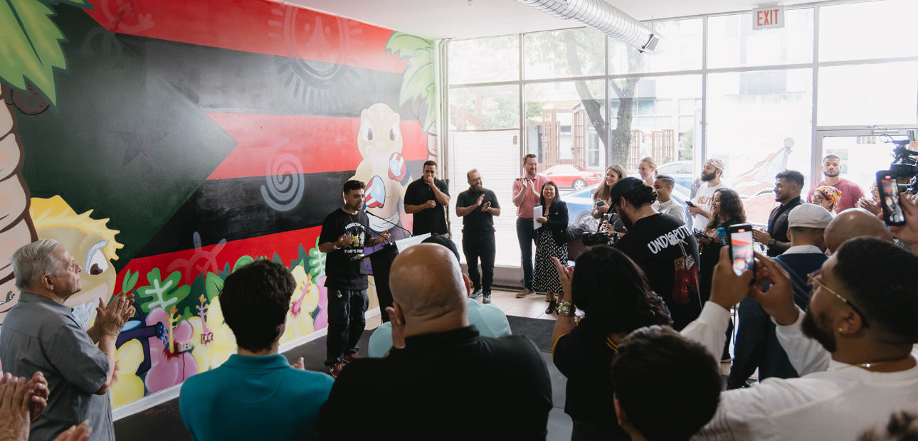 Neighborhood gathers for mural unveiling