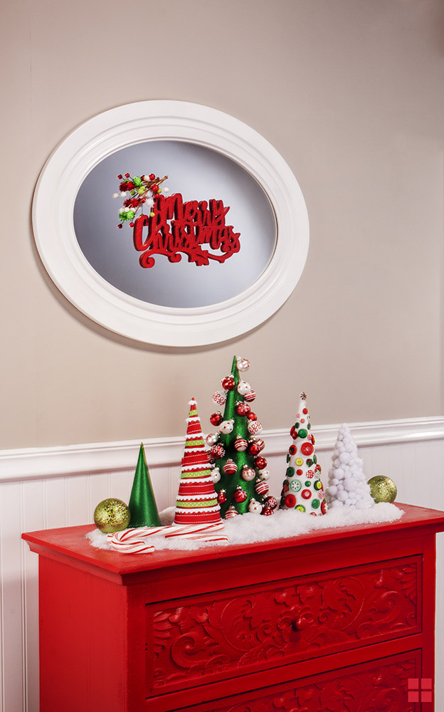 Spray painted Merry Christmas sign attached to a mirror.