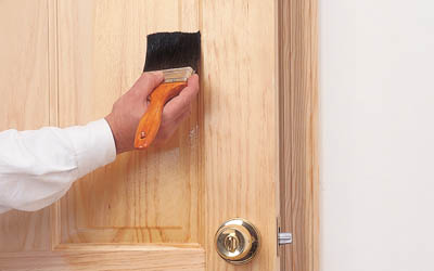 Sealer applying on a door