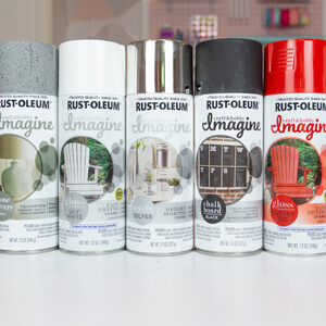 Six cans of Rust-Oleum Imagine spray paint.