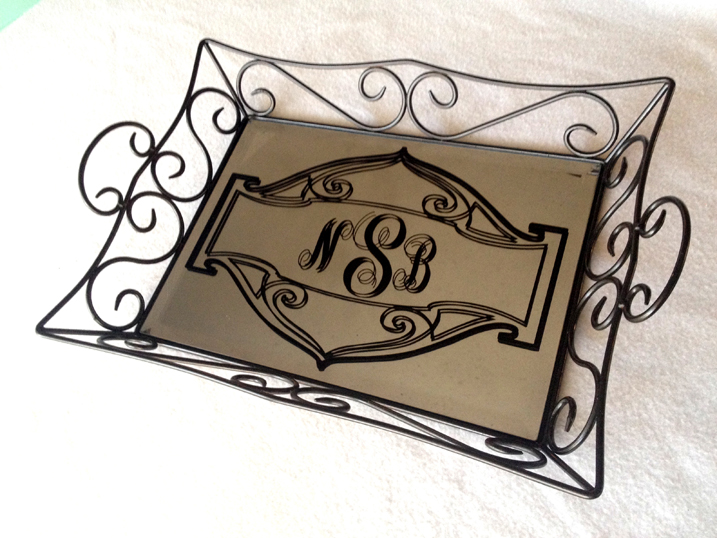 mirrored bottom serving tray with monogram on mirror